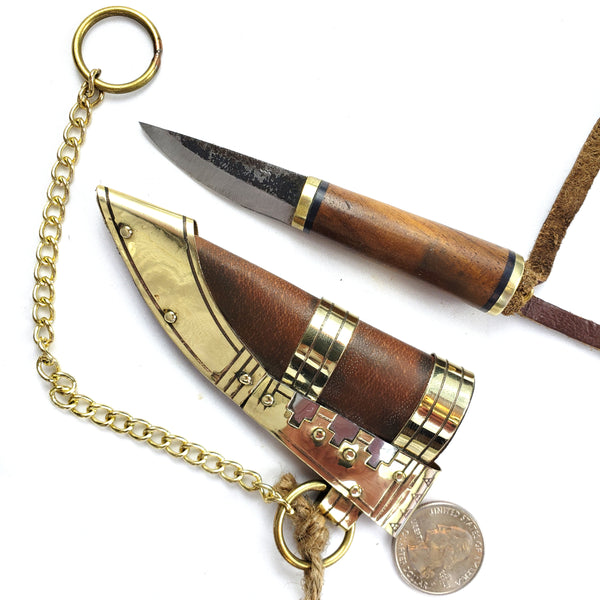 Viking Boob Bling, The Fibula Norse Seax with Chain is a small and robust tool steel blade sturdy and beautiful with a Rosewood handle with brass.   Decorated vegetable tanned leather sheath with Norse Viking brass and silver historical ornamentation