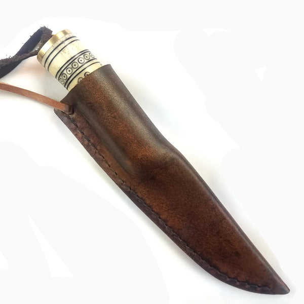 Viking Age Knife #59 with a Decorated Bone Handle with vegetable-tanned scabbard, hand-carved bone handle with historic style designs from the Viking Age shown with knife in leather scabbard read to carry