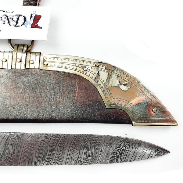 Tip decoration Rus Viking Damascus Knife #56A is a replica Viking Knife with decorated Sheath and features Norse decorative motifs carved in the bone handle accented with brass, and a Damascus blade that is sturdy and beautiful. The Brass decorated vegetable tanned sheath is a beauty to behold.  